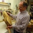 Bob Benedetto inspects Dan Sumner's Curly Spalted 16-B S1892