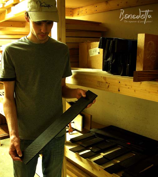Ben Crittenden holds rare flamed ebony in wood room, Benedetto Guitars, Savannah, GA May 2013 