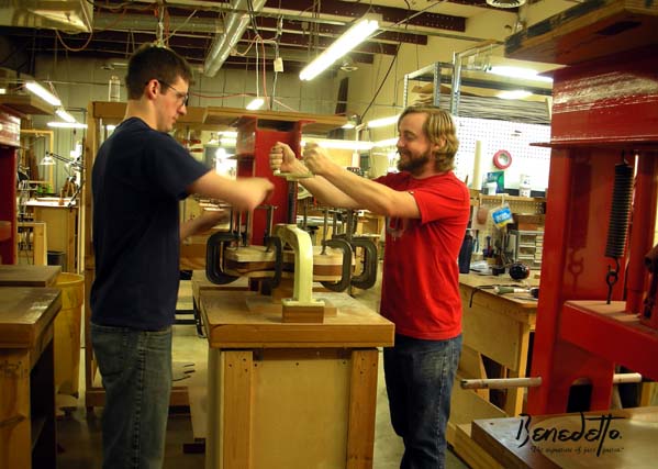 Luthiers Kaleb Fitting and Phillip Archibalnd glue maple top to Pat Martino Signature model at Benedetto Guitars, Savannah, GA 5-9-13