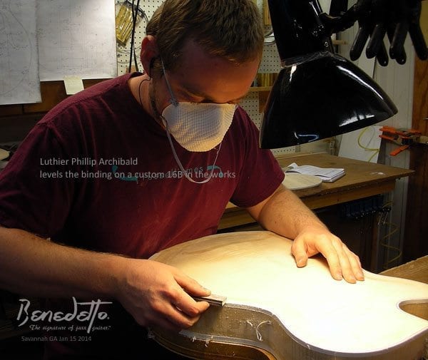 Luthier Phillip Archibald levels the binding on a custom Benedetto 16B in the works 1-15-14 sw News