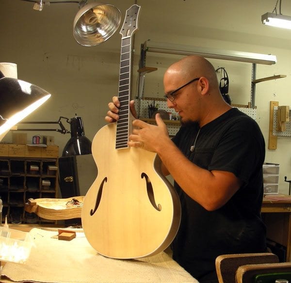 Luthier Steve Holzknecht checks neck set on a Benedetto Bravo 9-9-14 